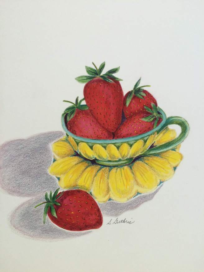 strawberries in a teacup
